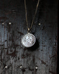 Pendentif Japonais en argent avec une pièce de monnaie 50 Sen Phénix